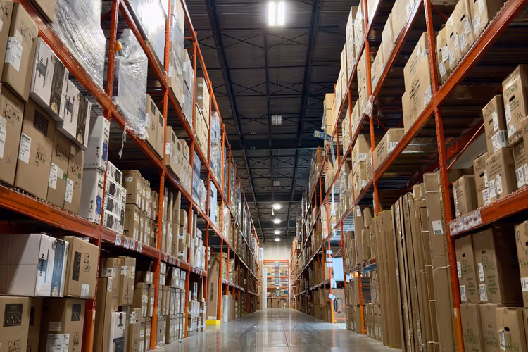 A long aisle between warehouse racks as an image of deep section nesting