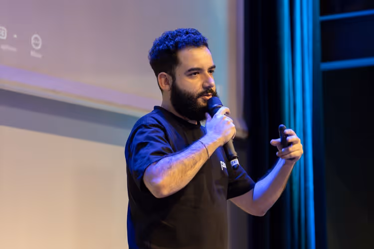 Speaker presenting to an audience at a professional conference