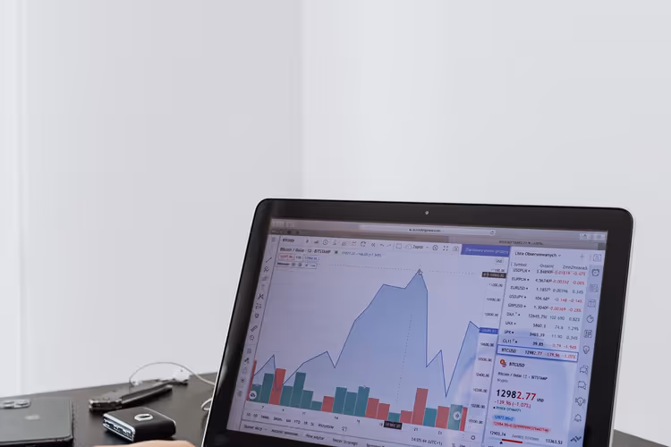Person at a laptop analyzing a visibility metrics report